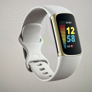 Used Fitbit charge 5. Also comes with additional band
